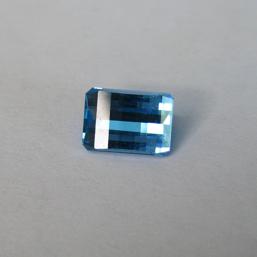 #169 Blue Topaz opposed bar 1.8cts